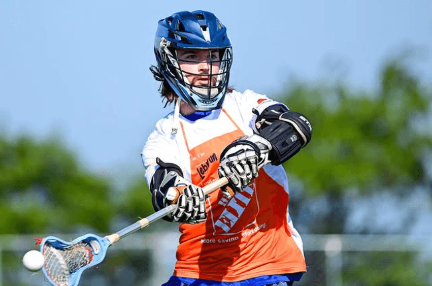 Coach Andy LeBrun playing lacrosse